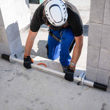 Mobile Anchor Point Skylotec Jambtac Shown Setting Up Across  A brick Wall Doorway